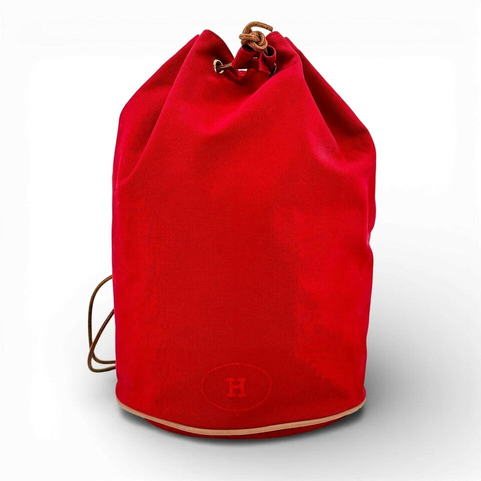 Rakuten - 【中古】HERMES レッド キャンバス バックパック ポロションミミル GM