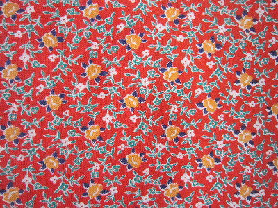 フィードサック 赤地小花　（1/16サイズ)