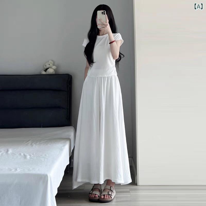 トミーショップ 楽天市場店のスカート レディース ミモレ丈 プリーツスカート パンツ付き ポリエステル 高見え Aライン フレアスカート ゆったり かわいい きれいめ 薄手 無地 オフィスカジュアル 通勤 韓国風 米白色 黒｜アングル2