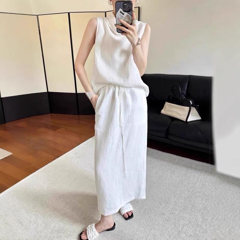 スカート レディース 抽縄 リネンブレンド ミモレ丈スカート 春夏 無地 ブラック 黒 ホワイト 白 カジ..