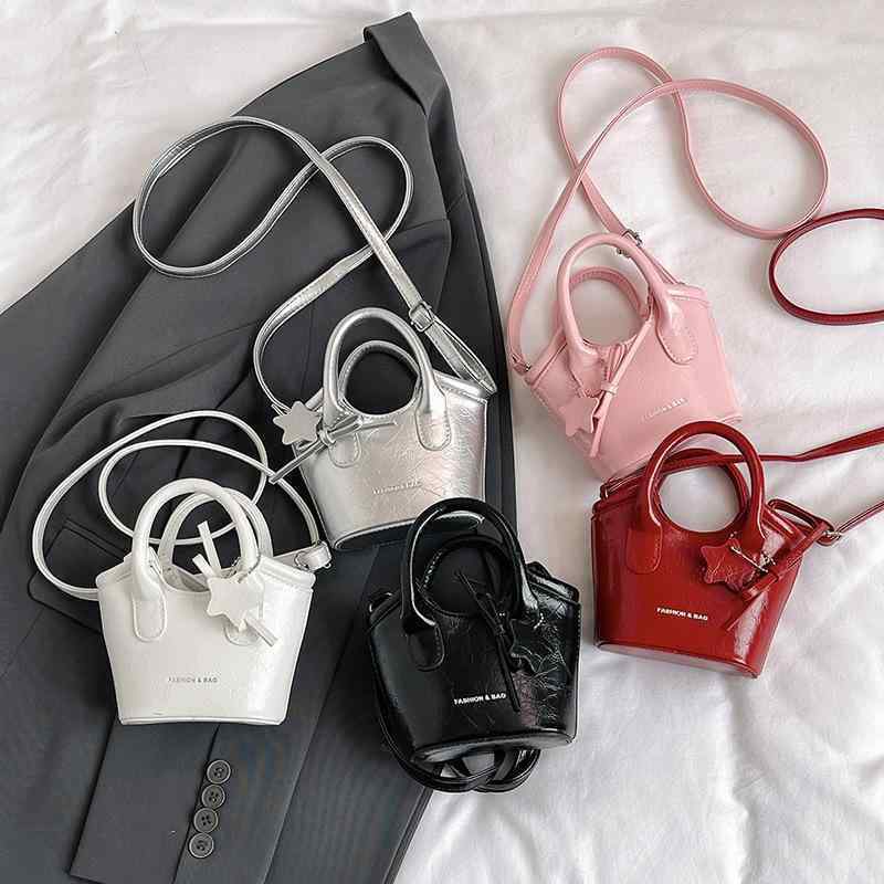 ショルダーバッグ レディース かわいい ミニ スター チャーム付き バケットバッグ PUレザー ハンドバッグ 肩掛け 普段使い 白色 ピンク系 銀色 赤色 黒色