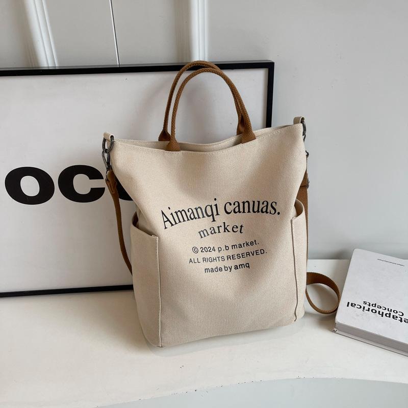 トートバッグ レディース 大容量 キャンバス 帆布 ショルダーバッグ カジュアル 斜めがけ 肩掛け 英字ロゴ ミディアムサイズ 通勤 通学