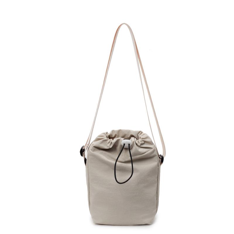 バッグ レディース ショルダーバッグ 斜めがけ バケットバッグ 巾着バッグ ナイロンバッグ ミニ スマートフォン ベージュ ブラック カーキ イエロー 水桶型 普段使い