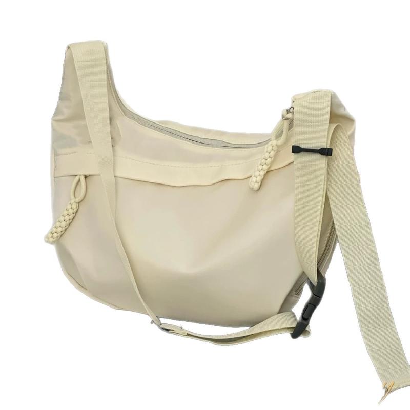 ショルダーバッグ レディース 大容量 オックスフォード キャンバス 餃子型 無地 通学 通勤 学生 マカロ..