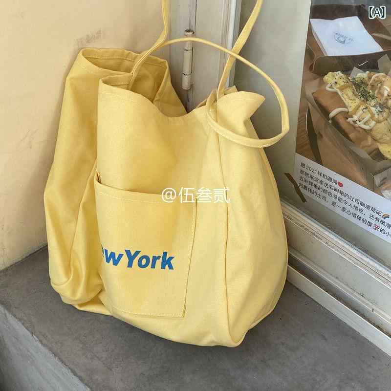 トートバッグ レディース 大容量 キャンバス ショルダーバッグ シンプル 英字プリント 学生 鞄 カジュ..