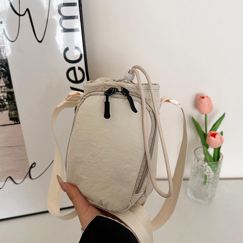 ショルダーバッグ レディース 水桶型 キャンバス 斜めがけ 小さめ 韓国風 カジュアル ストリート 無地 ..