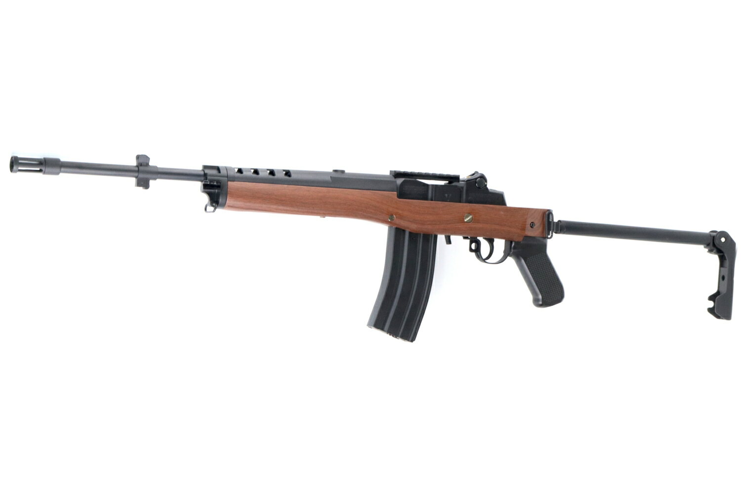 新品未使用 18歳以上対象商品 銃刀法規制適合品 U.S.M14ライフルライクのレイアウトかつコンパクトなデザインを持つ！ ルガー Mini-14 GBを再現したDOUBLE BELL製メタル電動ガン！ 民間向けの本体サイズとマガジンサイズに抑えつつも、M14やM1ガーランドのような軍用だけのレイアウトを再現した事で、似た操作感を民間でも楽しめたり慣れを持ち込めた名銃の1つです！ ストックは樹脂製に木目風塗装されたフェイクウッド仕様。 木材より軽めでキズに強い利点があり、カスタム塗装にも適しています。 ETU搭載による電子制御で、キレのある反応速度と低電圧保護機能、2〜3発のバーストショット機能もご使用いただけます。 動力として7.4vのバッテリーが別途必要で、ヒートシールド下部のストック底部内にあるコネクターから接続可能。 標準のマガジンは多弾装仕様で約300発まで6mmBB弾を収納可能。 底部のダイアルを回すことで、収納分の一部を給弾口まで巻き上げられます。 海外製品のため、ムラやキズなどがある場合がございますので予めご了承ください。 ● 素材：金属、樹脂 ● 対応：6mmBB弾 ● 初速：0.98J以下調整済み ● 装弾数：約300発（多弾装） ● 方式：セミオート ● 動力：7.4vバッテリー（別売） ● ETU機能：反応向上、バーストモード、低電圧保護など 対象年齢：18歳以上 18歳未満の方はご購入いただけません。初速（弾丸運動エネルギー: 0.98J以下）は0.98J以下に調整されている銃刀法規制適合品です。BB弾直径/口径: 6mm。 新品未使用品ですが海外製品のため、商品にムラや小傷がある場合がございますので予めご了承ください。