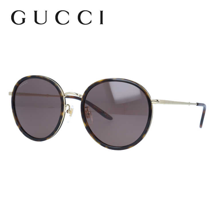 ブランドGUCCI（グッチ）品目サングラス型番GG0677SK 002 55サイズフィッティング調整可能ノーズパッド（クリングス）シェイプボストンカラーフレーム：ブラウン ハバナ・ゴールド（艶あり）レンズ：ブラウン素材フレーム：プラスチック（アセテート）/メタル（ニッケル合金）レンズ：プラスチック可視光線透過率15％紫外線カット率99％以上サイズ［A］レンズ幅：55mm［B］レンズ縦：50mm［C］ブリッジ幅：20mm［D］フレーム幅：145mm［E］テンプル長：150mm仕様・機能レンズカーブ：4カーブ重量：約26g（レンズを含む）付属品純正ケース純正ポーチ純正レンズクロス備考-GUCCI(グッチ)「最上の伝統を最上の品質で」をコンセプトに、その品質を保証する為に 世界で初めてデザイナーの名前を入れて商品を販売。その品質の高さは、多くのブランドの中でも特に実感できると言われており、グッチ（GUCCI）のデザイン性に優れるアイウェアは、身に着ける人のファッションに彩りをプラスします。そしてクリエイティブディレクターにアレッサンドロ・ミケーレが就任して以来、話題の絶えないGUCCI。本来のブランドの姿を取り戻すべくアイウェアの国内取扱い店舗を大きく絞り、ハイブランドとしての存在感を強く示しました。歴史やデザインのエッセンスが注ぎ込まれたアイテムをお楽しみください。