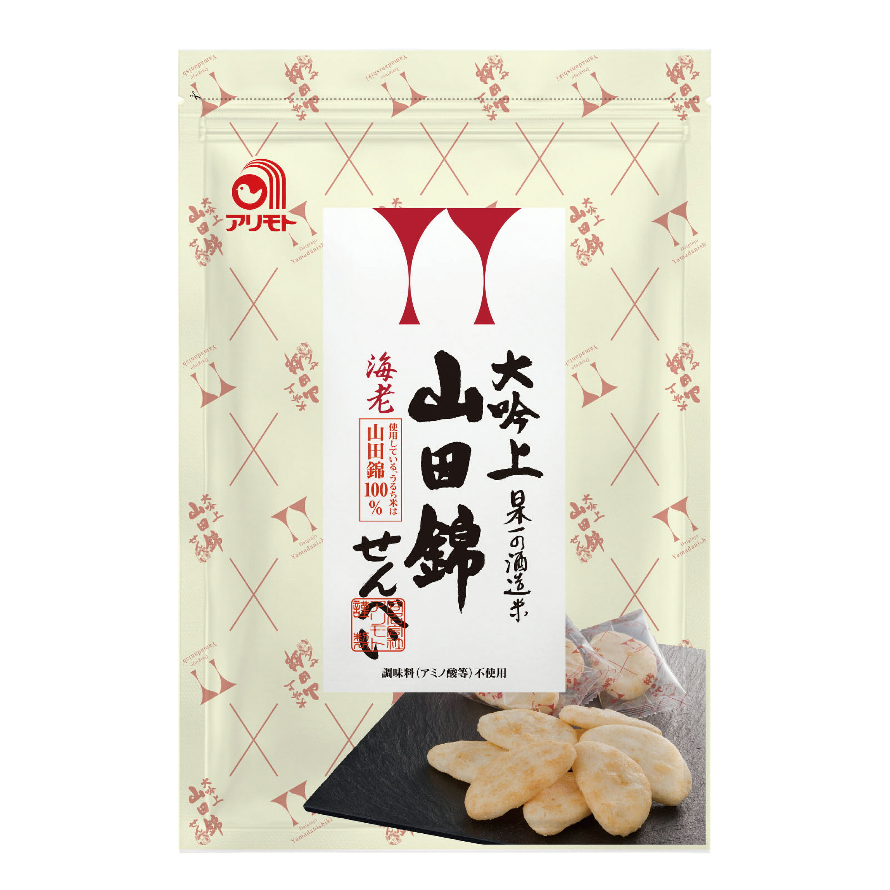酒造好適米「山田錦」100%使用 香ばしい干海老の風味、さくっと軽い食感 ■伝統海塩「海の精」使用 ■国産米ぬかでつくった米油使用 ■砂糖不使用 ■個包装 【原材料】 うるち米(国産)、米油、干海老(国産）、食塩(海の精)、昆布粉末、鰹節粉 【開封後の保存方法】 開封後はお早めに召し上がりください。 【調理法・使用方法】 そのまま召し上がりください。 【栄養成分表示】 100g(当たり)／エネルギー 458kcal／たんぱく質 6.1g／脂質 15.1g／炭水化物 74.5g／食塩相当量 1.2g 【アレルゲン】 えび 【販売者名・輸入者名】 合名会社アリモト
