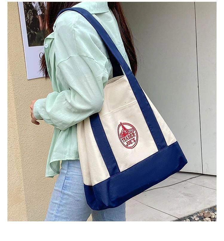 素材：コットン65％、ポリエステル35％ B-横幅:約33cm　縦:約28cm　底マチ:約15cm　持ち手:約60cm A-横幅:約51cm　縦:約35cm　底マチ:約15cm　持ち手:約60cm 買い物時だけでなく、普段使いもできるオールマイティなデザイン。 頑丈なキャンバス地、それでいてこのお値段！天才かな。