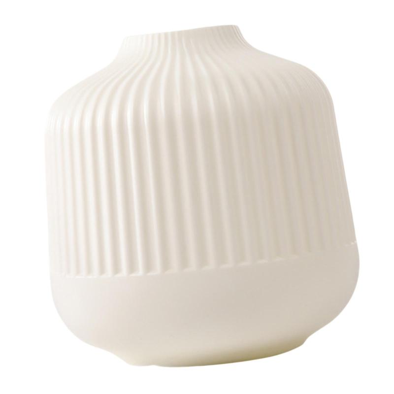 オフィスの本棚用.北欧風植物の束が入った花瓶