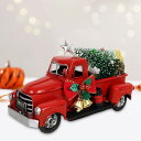 クリスマスの赤い金属トラックの装飾.装飾用
