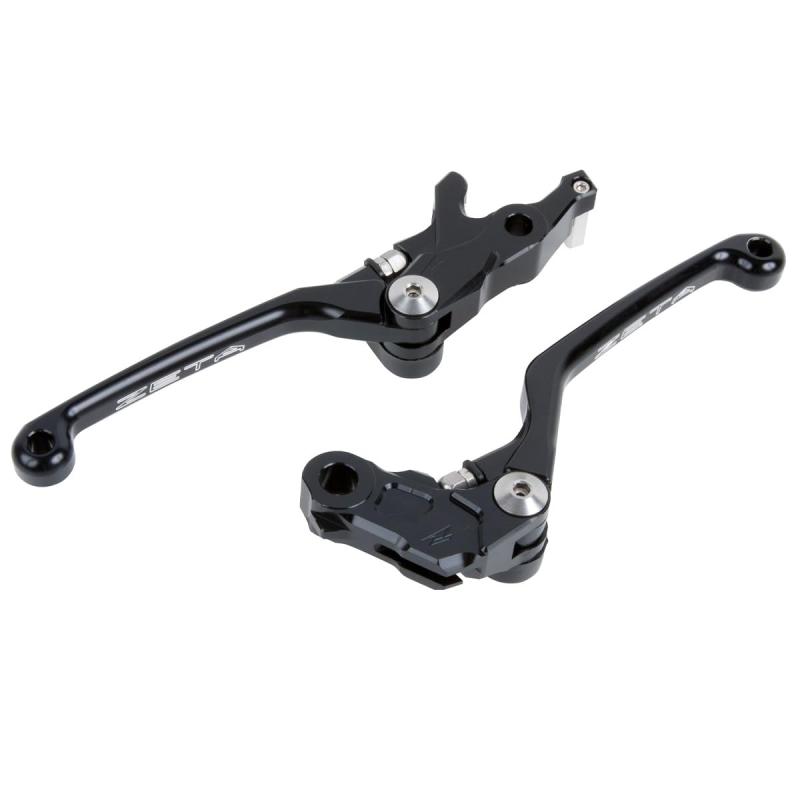 ジータレーシング(ZETA RACING) REBEL250/300/500, CB500F/X, NX400/500, CBR400R/500R, NC700S/X,NC750S/X etc ピボット ストリート レバーセット ブラックダートフリーク DIRTF F5転倒によるレバー破損を最小限に抑える可倒式レバー。クラッチ、ブレーキセット。 転倒後すぐに再スタートできるスプリング内蔵による自動レバー復帰システムを採用。手の大きさや握り方によって、ハンドルからレバーまでの間隔を好みに合わせて調整可能。2ピースで構成されたレバーはそれぞれに適材を採用。レバーアーム部分はジュラルミンの中でも粘りのある材質を使用し、相当な角度まで曲がっても折れにくい。 アダプター部分は高強度な7000系アルミニウム合金を使用し、ダイレクトな操作感を提供する。軽量・高精度を追求し、細部に至るまでCNCマシンで360°全面切削加工を施す。レバー位置調整をする際、レバーをグリップに近づけすぎると、クラッチスイッチが反応しなくなる恐れがありますのでご注意ください。