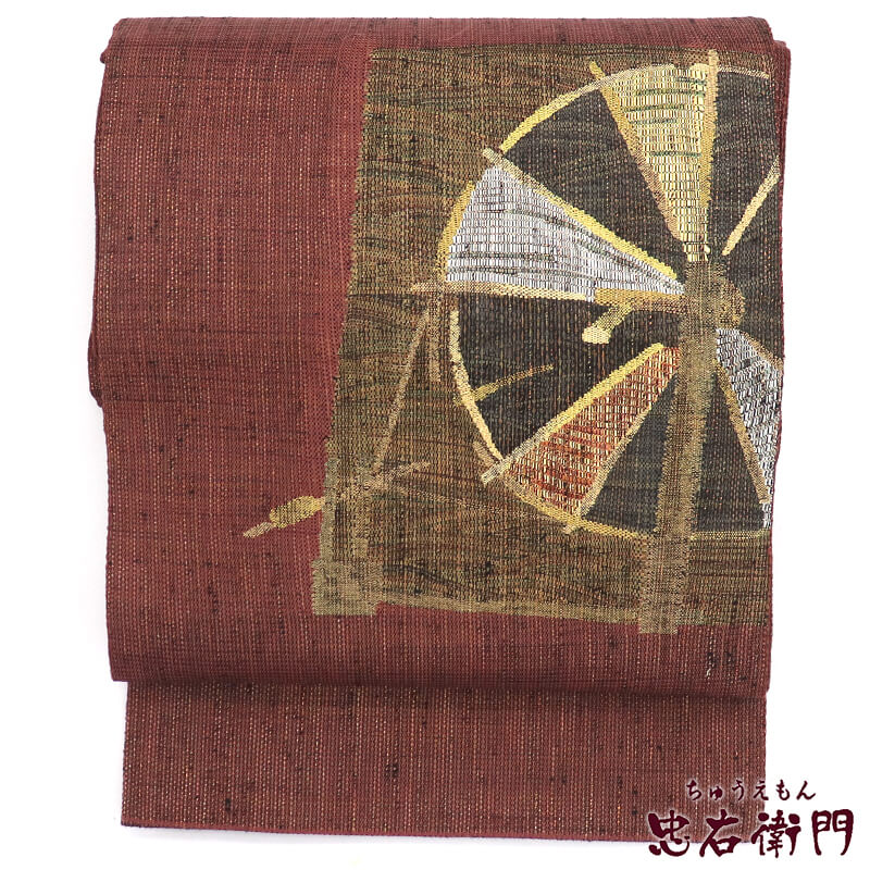 【中古】 袋帯 おしゃれ袋帯 洒落 正絹 お太鼓柄 臙脂 ワイン 糸車 長さ452cm 幅31cm リサイクル 和装 ..