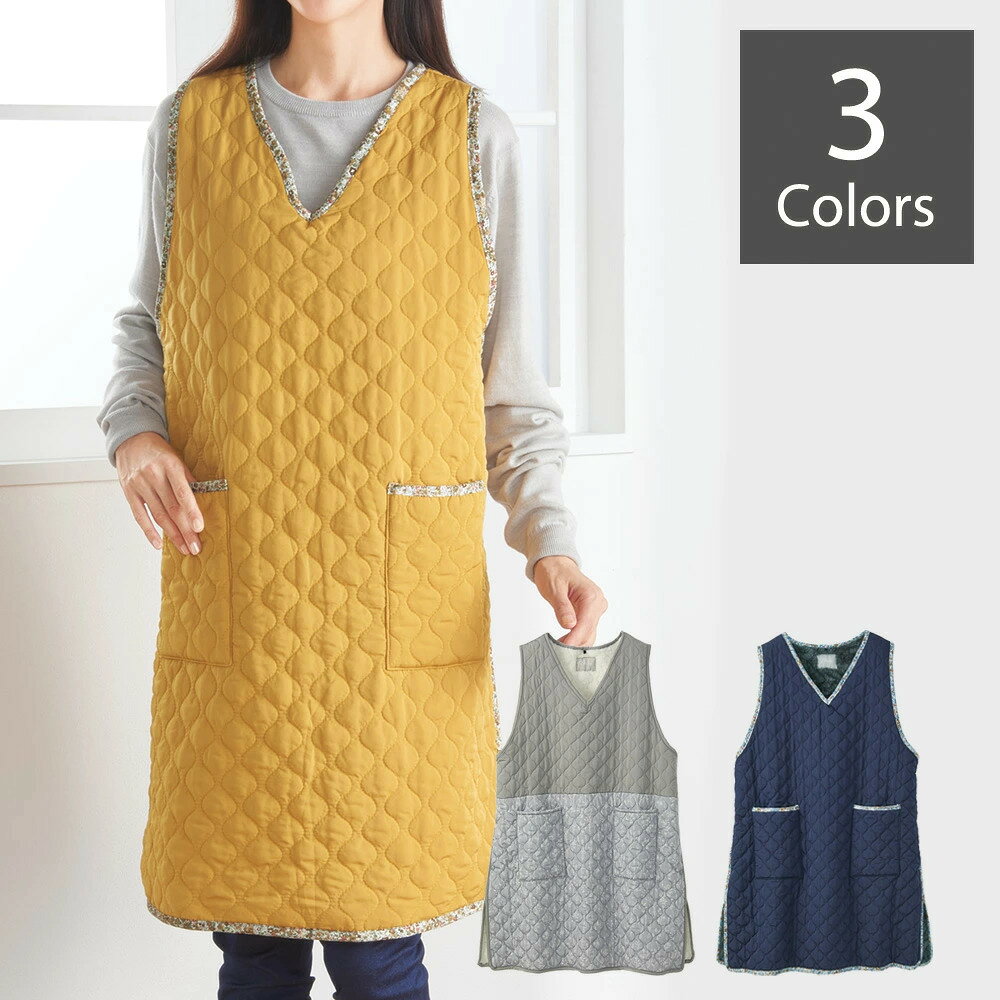 商品説明袖なしで動きやすく、服の上からも着やすいゆったりとしたデザイン。表地はキルト加工、裏地はボアでキッチンの冷え対策にオススメです。・両サイドにボタン付きでらくらく着脱・便利な大型ポケットにはスマホも入ります・撥水加工でお手入れも簡単【 商品詳細 】●材質／本体：ポリエステル100％、ネイビー・マスタードのパイピング部分：綿100％●サイズ(cm)／約 縦90、横65、対応バスト79-94、対応身長154-162●製造国／中国※グレーは販売終了いたしました。