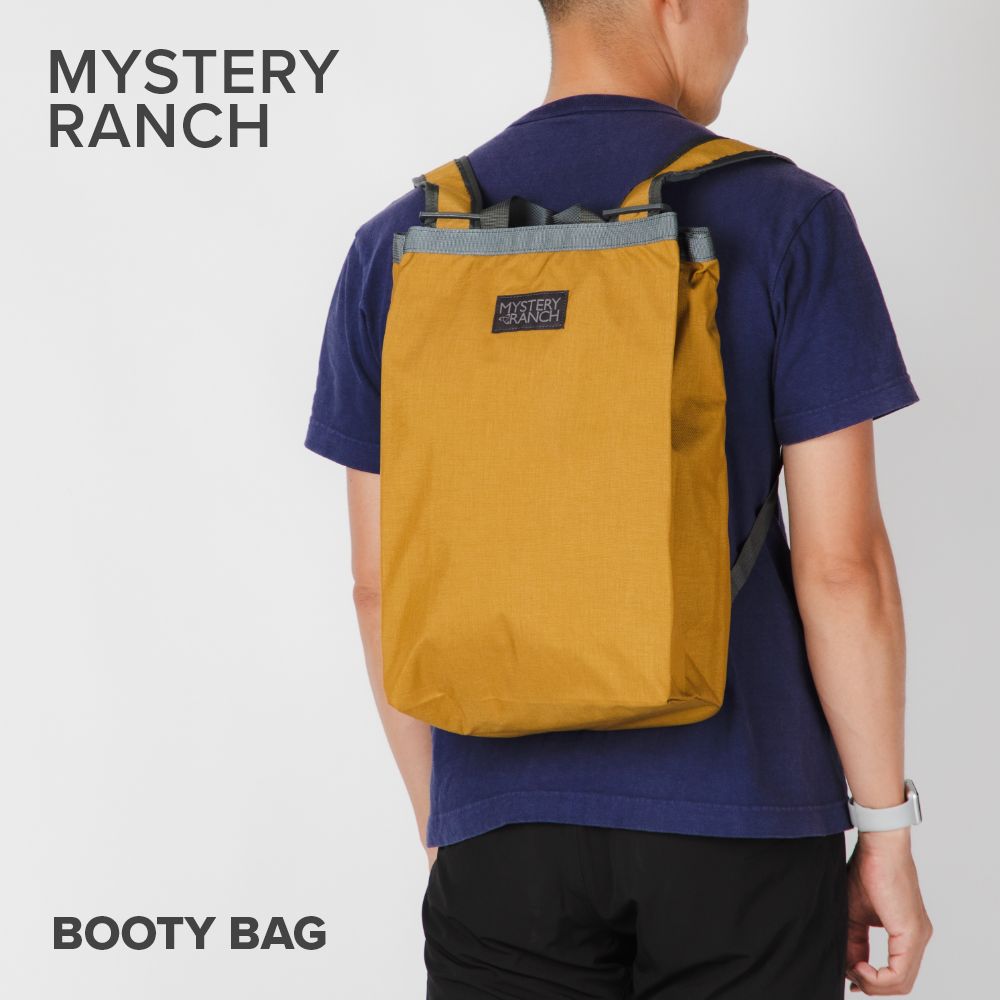 ミステリーランチ MYSTERY RANCH BOOTY BAG バックパック ブーティバッグ メンズ バッグ リュックサック 16L ビジネス お出かけ カジュアル 通勤 通学 2WAY トートバッグ タウンユース アウトドア ギフト プレゼント 誕生日 記念 ブロンズ【2022SS】 【PUP】