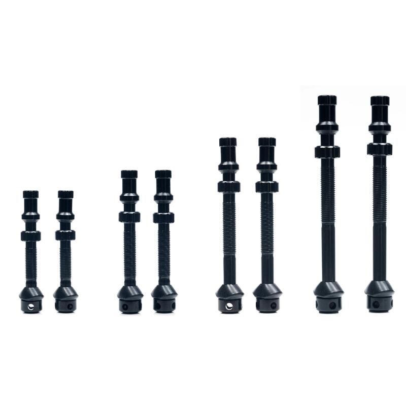 Stans NoTubes (スタンズノーチューブス) ユニバーサル+ バルブセット ブラック タイヤインサート対応のアルミ製チューブレスバルブ EXO-CORE VALVE と同様の5つのエアフローホール（側面に4つ、底面に1つ）を備えたチューブレスバルブです。チューブレスタイヤをセットアップする際のスムーズなエアとシーラントの流入を実現しました。バルブコアを取り外して EXO-CORE HOUSING KIT（別売） を装着すれば EXO CORE VALVE にアップグレードできます。 インフレート時の空気とシーラント注入の流量を高める新デザイン タイヤインサート対応 安全で着脱が容易なプレスオン式ダストキャップ（TAP CAP） リムとの高い嵌合性を実現する新デザインのベース VALVE COLOR KIT（別売）と組み合わせてカラーコーディネートが可能（キャップ＋ナット） 4種類のサイズ展開（リムハイト最大46mmまで対応） アルミ製 ご注文の前にご確認ください。 表示されている在庫情報については、実際の在庫情報と連動しておりません。 ご注文頂きましたら、弊社および仕入先の在庫を確認いたしまして、メールにてご連絡させて頂きます。 廃盤や欠品・納期未定などの理由により、ご注文をキャンセルさせていただく場合がございます。 商品のカラーはディスプレイ環境により実物と異なって見える場合がございます。 掲載商品の仕様、ロゴ等のデザインはランニングチェンジ等により予告なく変更になる場合があります。 ご利用規約の内容をご覧いただき、ご了承頂いた上でご注文をお願い致します。