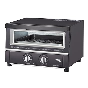 【中古】タイガー魔法瓶(TIGER) オーブントースター 断熱Wガラス 温度調節機能 30分タイマー トースト3枚 1300W マットブラック KAT-B131KM【メーカー名】【メーカー型番】【ブランド名】タイガー魔法瓶(TIGER) オーブントースター 【商品説明】タイガー魔法瓶(TIGER) オーブントースター 断熱Wガラス 温度調節機能 30分タイマー トースト3枚 1300W マットブラック KAT-B131KM「断熱Wガラス」でトーストの水分蒸発率を抑え、表面はサクッと、中はアツアツでふわっとした食感のトーストに。「ワイド&ワイド」お料理の状態がひと目で分かる「ワイドガラス面」。トースト3枚、約25cmピザも焼ける「ワイド&ビック庫内」。「取りやすいん棚(だな)」:焼アミがまっすぐにスライドして、中の料理やトーストが取り出しやすい構造です。商品サイズ本体:37.7×34.5×24.5cm 商品重量:4.7kgブランド:タイガー魔法瓶(TIGER)当店では初期不良に限り、商品到着から7日間は返品を 受付けております。お問い合わせ・メールにて不具合詳細をご連絡ください。他モールとの併売品の為、完売の際はキャンセルご連絡させて頂きます。中古品の商品タイトルに「限定」「初回」「保証」「DLコード」などの表記がありましても、特典・付属品・帯・保証等は付いておりません。電子辞書、コンパクトオーディオプレーヤー等のイヤホンは写真にありましても衛生上、基本お付けしておりません。※未使用品は除く品名に【import】【輸入】【北米】【海外】等の国内商品でないと把握できる表記商品について国内のDVDプレイヤー、ゲーム機で稼働しない場合がございます。予めご了承の上、購入ください。掲載と付属品が異なる場合は確認のご連絡をさせて頂きます。ご注文からお届けまで1、ご注文⇒ご注文は24時間受け付けております。2、注文確認⇒ご注文後、当店から注文確認メールを送信します。3、お届けまで3〜10営業日程度とお考えください。4、入金確認⇒前払い決済をご選択の場合、ご入金確認後、配送手配を致します。5、出荷⇒配送準備が整い次第、出荷致します。配送業者、追跡番号等の詳細をメール送信致します。6、到着⇒出荷後、1〜3日後に商品が到着します。　※離島、北海道、九州、沖縄は遅れる場合がございます。予めご了承下さい。お電話でのお問合せは少人数で運営の為受け付けておりませんので、お問い合わせ・メールにてお願い致します。営業時間　月〜金　11:00〜18:00★お客様都合によるご注文後のキャンセル・返品はお受けしておりませんのでご了承ください。0