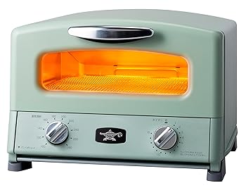 【中古】アラジン グラファイト グリル＆トースター グリーン 4枚焼き AGT-G13B(G) 【モノギャラリー限定レシピブック付】【メーカー名】【メーカー型番】【ブランド名】モノギャラリー オーブントースター 【商品説明】アラジン グラファイト グリル＆トースター グリーン 4枚焼き AGT-G13B(G) 【モノギャラリー限定レシピブック付】サイズ:約幅36cm×奥行き35.5cm×高さ25cm / コード長さ1m　本体重量:約4.7kgトースター内サイズ:約幅31cm×28.5cm×8.7cm　焼ける枚数:4枚定格消電力・電源:1390W・AC100V 50-60Hz機能:温度調節つまみ:(100℃〜280℃) 無段階切替タイマー:最大15分(報知音付き)付属品:グリルパン(波)、グリルパン(平)、グリルプレート、レシピブック、コンセプトブック、取扱説明書（保証書付）当店では初期不良に限り、商品到着から7日間は返品を 受付けております。お問い合わせ・メールにて不具合詳細をご連絡ください。他モールとの併売品の為、完売の際はキャンセルご連絡させて頂きます。中古品の商品タイトルに「限定」「初回」「保証」「DLコード」などの表記がありましても、特典・付属品・帯・保証等は付いておりません。電子辞書、コンパクトオーディオプレーヤー等のイヤホンは写真にありましても衛生上、基本お付けしておりません。※未使用品は除く品名に【import】【輸入】【北米】【海外】等の国内商品でないと把握できる表記商品について国内のDVDプレイヤー、ゲーム機で稼働しない場合がございます。予めご了承の上、購入ください。掲載と付属品が異なる場合は確認のご連絡をさせて頂きます。ご注文からお届けまで1、ご注文⇒ご注文は24時間受け付けております。2、注文確認⇒ご注文後、当店から注文確認メールを送信します。3、お届けまで3〜10営業日程度とお考えください。4、入金確認⇒前払い決済をご選択の場合、ご入金確認後、配送手配を致します。5、出荷⇒配送準備が整い次第、出荷致します。配送業者、追跡番号等の詳細をメール送信致します。6、到着⇒出荷後、1〜3日後に商品が到着します。　※離島、北海道、九州、沖縄は遅れる場合がございます。予めご了承下さい。お電話でのお問合せは少人数で運営の為受け付けておりませんので、お問い合わせ・メールにてお願い致します。営業時間　月〜金　11:00〜18:00★お客様都合によるご注文後のキャンセル・返品はお受けしておりませんのでご了承ください。0