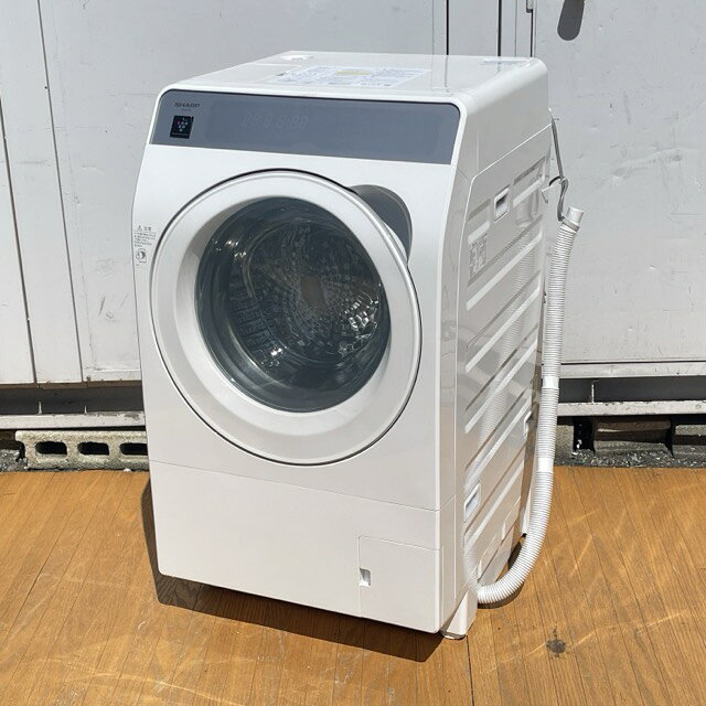 送料無料 美品 SHARP ドラム式電気洗濯乾燥機 ES-K11C-WL 2025年製 11.0kg ホワイト 077020 ドラム式洗濯機 C/24092 商品詳細 型番: ES-K11C 年式: 2025 年製 付属品: 給水ホース サイズ(幅/奥行き/高さ): 約 64.5/73.2/110 cm ※素人寸法です。若干の誤差はご了承下さい。 商品は写真にあるもので全てです。 必ず写真で確認お願い致します。他にもたくさん出品しています。 状態 状態ランク B　目立ったキズや汚れ無し 状態ランク表 SSS　新品未開封 SS　未使用品 S　展示品 A　使用感が全くなく綺麗 B　目立ったキズや汚れ無し C　少しキズ、汚れがある D　キズや汚れがある E　目立ったキズ、汚れがある F　目立ったキズ、汚れが多くある G　破損個所がある H　破損個所が多くある 状態チェック担当者のコメント 美品です 動作 動作ランク A　動作問題なし 動作ランク表 S　新品未開封 未使用 A　動作問題なし B　一部分のみ未チェック C　多少難有り D　通電のみ確認 E　難有り F　未チェック G　ジャンク品 動作チェック担当者のコメント 動作確認済みです。商品到着後8日間の動作を保証いたします。 支払詳細 ページ下部にてご確認ください。 発送詳細 家財おまかせ便（送料無料）にて埼玉県より発送いたします。らくらく家財便での発送はお届けの際にお立合いが必要となります。 配達希望日の指定が必要な場合は手配から集荷までに多少お時間をいただくためご購入手続き後より5日以降の配達希望日をご入力をお願い致します。 配達希望日のご入力がない場合は希望日無しの最短発送にて手配させていただきます。 ※北海道、九州、沖縄県、離島への発送は行っておりません。 ※時間指定ができない地域がございます。ご購入前にヤマト運輸ホームページにてご確認くださいませ。 注意事項 ※タイトルの末尾は管理番号となります。※ジャンク品の商品は、故障や破損、欠品、動作未確認、 正常な動作のお約束ができない等、様々な理由にてジャンク品として販売をさせて頂いております。その為、商品の返品・返金・交換等の 対応は出来ません。修理、パーツ取りなどを想定しお買い求め下さい。 ※保証について動作保証と記載のある商品については、商品に不具合が生じた場合、商品到着後8日以内は返品、返金をお受けいたします。取付や工事が必要なものに関しましては、それに必要な費用は当方では負担致しません。 取付費、工事費は保証対象外となります。当方で販売いたしました商品が明確な原因で重大な事故へと発展いたしました場合にも、商品代金の2倍以上の責任は負いかねます。商品を利用される際には、必ず状態をご確認ください。 ※評価について恐れ入りますが当方から評価はしておりません。評価が必要な場合、受取連絡の際に取引ナビでご連絡下さい。よろしくお願い致します。 誠に勝手ながら各週日曜日が定休日となります。そのためご連絡、発送、手渡し対応等行っておりません。予めご了承の上ご落札をお願い致します。 同梱ご希望の場合は必ずお支払い前にご連絡をお願い致します。※ 新品及び未使用品は商品到着後8日間の動作を保証いたします。