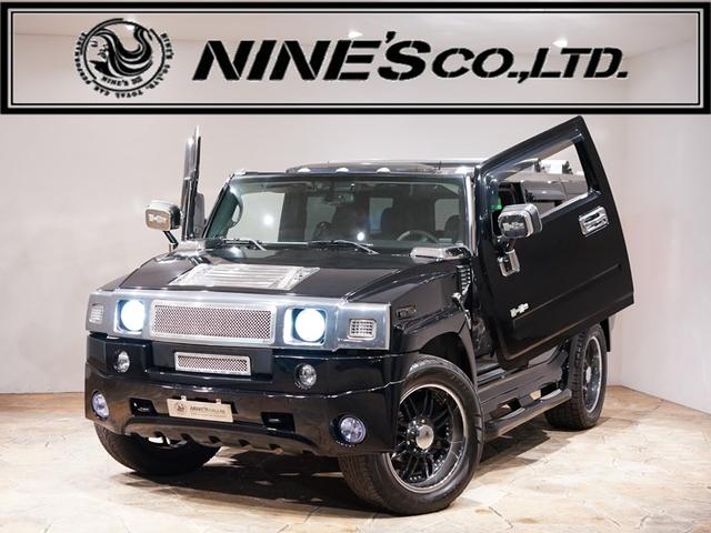 中古車 SUV・クロカン ブラック 黒色 4WD ガソリン 不明 ガルウイング／ゼノンエアロ／張替コンビレザー／ 4本出しマフラー／KMC22AW／バイザーモニター／2005年モデル