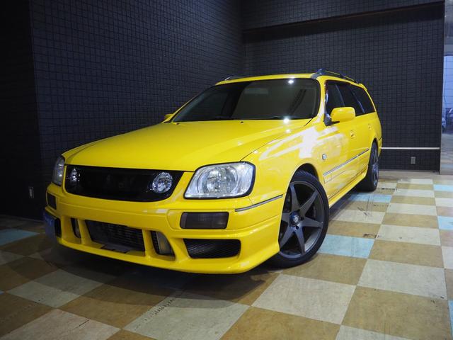 ステージア 25t RS FOUR S（日産）【中古】 中古車 ステーションワゴン イエロー 黄色 4WD ガソリン