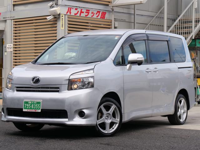 中古車 ミニバン/ワンボックス ゴールド・シルバー 金色 銀色 2WD ガソリン ZRR70G 8人乗車中泊シート3列目跳上げWエアコンCVT ノアヴォクシワンボックスベット車中泊保証付フルフラットシート両側スライド