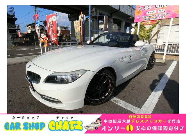 中古車 オープンカー ホワイト 白色 2WD ガソリン LM25 オークション無事故4．5点美車！低走行！電動オープン ！黒革PWシート！シートH！HDDナビフルセグ！HID！外AW！車高調！