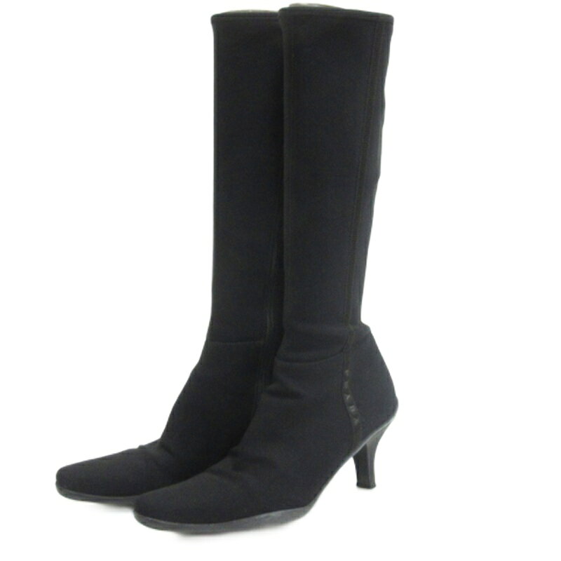 【中古】プラダスポーツ PRADA SPORT ロング ブーツ ブラック 38.5 ■GY62 レディース 【ベクトル 古着】 260407ブランドプラダスポーツ PRADA SPORT表記サイズ38.5 25.5cm相当実寸サイズ筒周り：36cm　筒高：36.5cm　ヒールの高さ：7.5cm　足首：27cm　　色ブラック状態・トップリフトにすり減りあり ※あくまでも中古品ですので掲載写真や記載内容をご確認いただき、ご理解の上ご購入ください。商品のお問い合わせの回答を休止しております。＊各商品ページの商品詳細等をご確認の上ご購入ください。【中古】プラダスポーツ PRADA SPORT ロング ブーツ ブラック 38.5 ■GY62 レディース 【ベクトル 古着】 260407状態ランク　”AB”詳細については、下記および「状態ランクについて」ページをご覧ください。未使用・新品の商品ほぼ新品同様の商品使用感が少なく、かなり状態の良い商品使用感はあるが、傷や汚れの少ない商品使用感の他、傷や汚れが見られる商品かなり大きな傷みがある難あり商品※S〜CランクはUSED品となりますので、使用感をご理解の上でご入札下さい。状態ランクについてinformationブランドプラダスポーツ PRADA SPORT表記サイズ38.5 25.5cm相当実寸サイズ筒周り：36cm　筒高：36.5cm　ヒールの高さ：7.5cm　足首：27cm　　色ブラック状態・トップリフトにすり減りあり ※あくまでも中古品ですので掲載写真や記載内容をご確認いただき、ご理解の上ご購入ください。商品のお問い合わせの回答を休止しております。＊各商品ページの商品詳細等をご確認の上ご購入ください。本商品は一点物です他サイトや店舗にて販売している商品です。多少のお時間差にて欠品になることもございます。予めご了承頂ますようお願い致します。ベクトル・サイズガイドはこちらこの商品と同じブランドの商品を見る