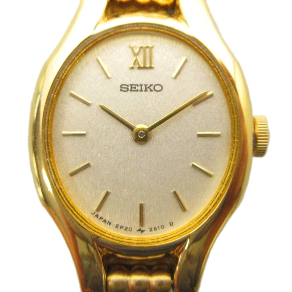 NIXON - 【中古】セイコー SEIKO 2P20-6230 腕時計 ウォッチ クォーツ ラウンド 白文字盤 ゴールド色 ■GY18 /MQ レディース 【ベクトル 古着】 260409