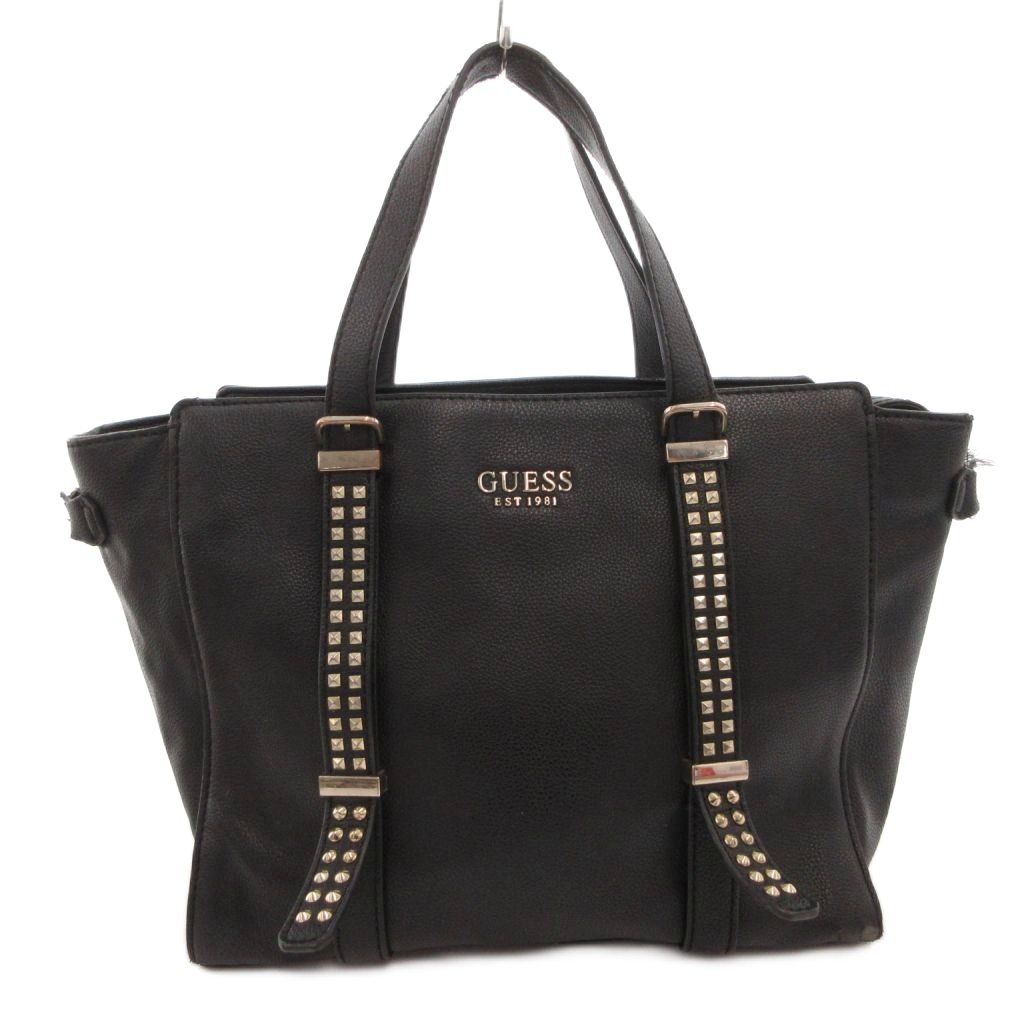 【中古】ゲス GUESS ハンドバッグ 手提げ レザーロゴ スタッズ 黒 ブラック /FF ■GY18 レディース 【ベクトル 古着】 260322ブランドゲス GUESS実寸サイズ持ち手の長さ：33cm　ヨコ：38cm　タテ：25cm　マチ：12cm　　素材レザー色黒 ブラック 状態・内側全体に細かい繊維の付着、薄汚れ ・表面角、持ちてなど擦れ、剥がれ ・側面にダメージ ※使用感の他、上記のようにダメージがある中古品です。掲載写真や記載内容をご確認いただき、ご理解の上ご購入ください。備考こちらのお品物は店舗で保管しておらず、店頭販売出来かねます。（※お取り寄せも出来かねます）商品のお問い合わせの回答を休止しております。＊各商品ページの商品詳細等をご確認の上ご購入ください。【中古】ゲス GUESS ハンドバッグ 手提げ レザーロゴ スタッズ 黒 ブラック /FF ■GY18 レディース 【ベクトル 古着】 260322状態ランク　”C”詳細については、下記および「状態ランクについて」ページをご覧ください。未使用・新品の商品ほぼ新品同様の商品使用感が少なく、かなり状態の良い商品使用感はあるが、傷や汚れの少ない商品使用感の他、傷や汚れが見られる商品かなり大きな傷みがある難あり商品※S〜CランクはUSED品となりますので、使用感をご理解の上でご入札下さい。状態ランクについてinformationブランドゲス GUESS実寸サイズ持ち手の長さ：33cm　ヨコ：38cm　タテ：25cm　マチ：12cm　　素材レザー色黒 ブラック 状態・内側全体に細かい繊維の付着、薄汚れ ・表面角、持ちてなど擦れ、剥がれ ・側面にダメージ ※使用感の他、上記のようにダメージがある中古品です。掲載写真や記載内容をご確認いただき、ご理解の上ご購入ください。備考こちらのお品物は店舗で保管しておらず、店頭販売出来かねます。（※お取り寄せも出来かねます）商品のお問い合わせの回答を休止しております。＊各商品ページの商品詳細等をご確認の上ご購入ください。本商品は一点物です他サイトや店舗にて販売している商品です。多少のお時間差にて欠品になることもございます。予めご了承頂ますようお願い致します。ベクトル・サイズガイドはこちらこの商品と同じブランドの商品を見る