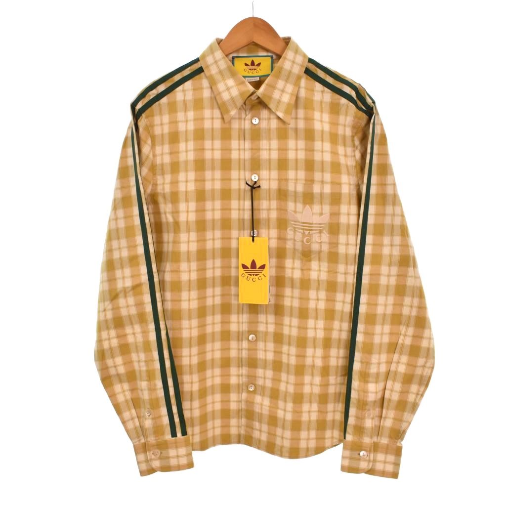【中古】グッチ GUCCI アディダス adidas シャツ 長袖 チェック ロゴ刺? 15+ 黄 イエロー 726087 メンズ 【ベクトル 古着】 260905ブランドグッチ GUCCI表記サイズ15+実寸サイズ肩幅：44cm　身幅：53cm　着丈：70cm　袖丈：64.5cm　　色黄色 イエロー状態使用感が少なく、かなり状態の良い商品です。 ※あくまでも中古品ですので掲載写真や記載内容をご確認いただき、ご理解の上ご購入ください。付属品・タグは別商品の物です備考品番 726087 （株）ケリングジャパングッチディビジョン商品のお問い合わせの回答を休止しております。＊各商品ページの商品詳細等をご確認の上ご購入ください。【中古】グッチ GUCCI アディダス adidas シャツ 長袖 チェック ロゴ刺? 15+ 黄 イエロー 726087 メンズ 【ベクトル 古着】 260905状態ランク　”A”詳細については、下記および「状態ランクについて」ページをご覧ください。未使用・新品の商品ほぼ新品同様の商品使用感が少なく、かなり状態の良い商品使用感はあるが、傷や汚れの少ない商品使用感の他、傷や汚れが見られる商品かなり大きな傷みがある難あり商品※S〜CランクはUSED品となりますので、使用感をご理解の上でご入札下さい。状態ランクについてinformationブランドグッチ GUCCI表記サイズ15+実寸サイズ肩幅：44cm　身幅：53cm　着丈：70cm　袖丈：64.5cm　　色黄色 イエロー状態使用感が少なく、かなり状態の良い商品です。 ※あくまでも中古品ですので掲載写真や記載内容をご確認いただき、ご理解の上ご購入ください。付属品・タグは別商品の物です備考品番 726087 （株）ケリングジャパングッチディビジョン商品のお問い合わせの回答を休止しております。＊各商品ページの商品詳細等をご確認の上ご購入ください。本商品は一点物です他サイトや店舗にて販売している商品です。多少のお時間差にて欠品になることもございます。予めご了承頂ますようお願い致します。ベクトル・サイズガイドはこちらこの商品と同じブランドの商品を見る