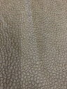 インポート生地です。色は黒×紺色使いで表面に丸の刺繍が施されています。コットン56、シルク44%なので秋口から初冬にかけての羽織物に最適です。130×1.78M 有