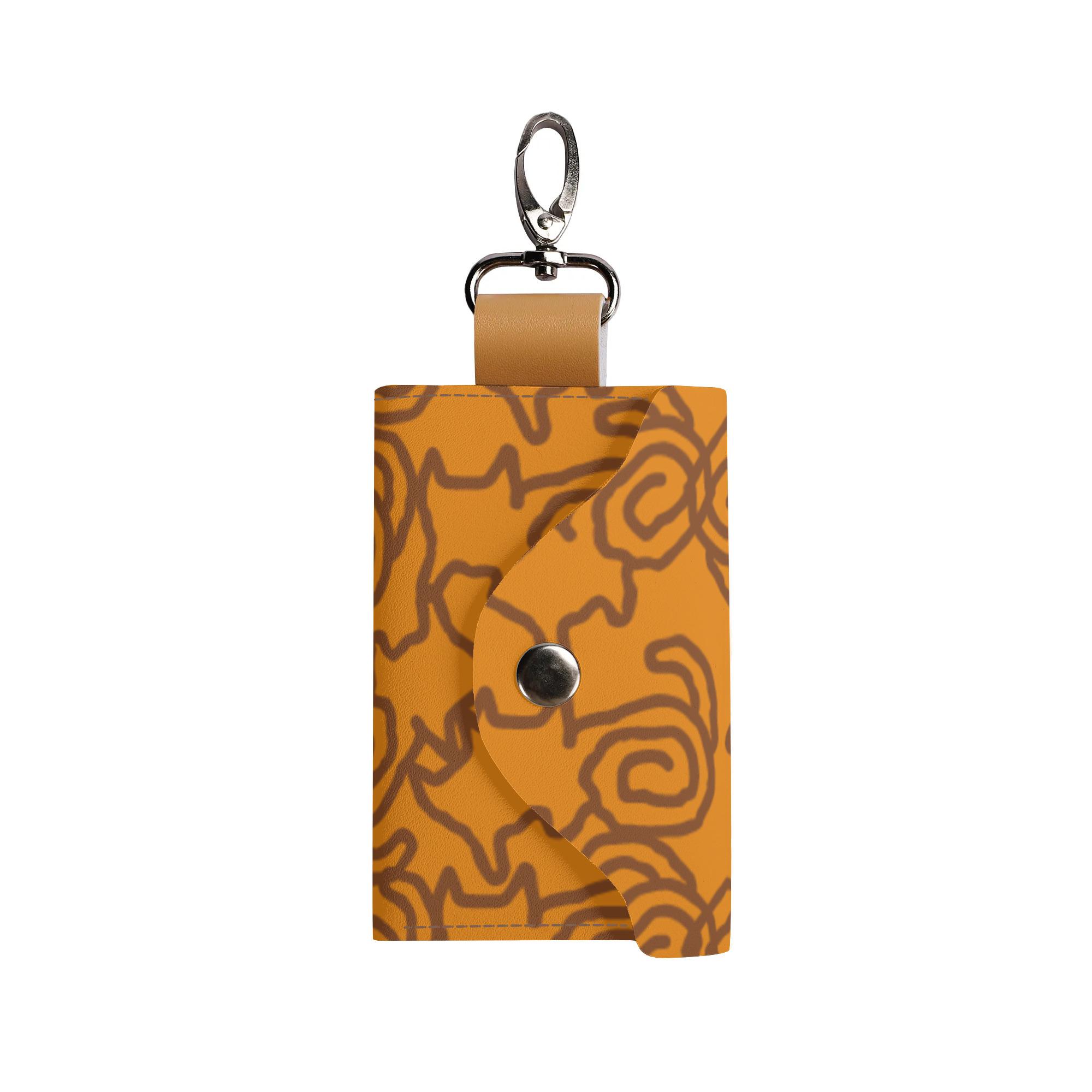 ねこのひげあつめ。うずうずかにゃくさ模様 おれんじ(キーケース) キーケース ユニセックス アクセサリ..