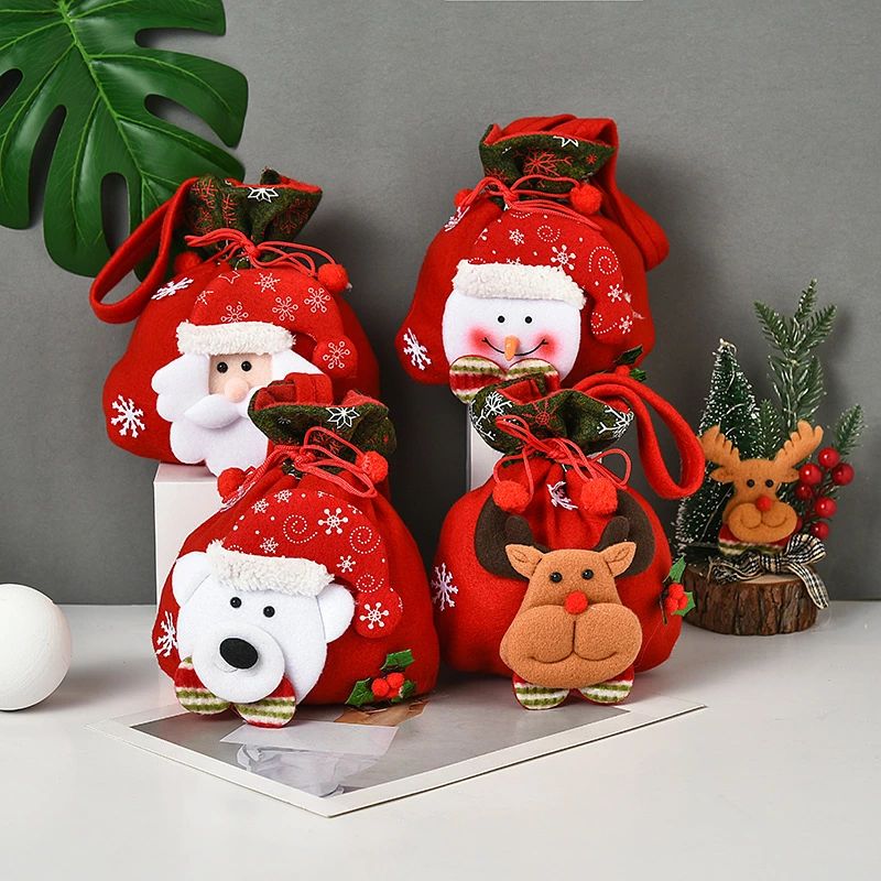 【PT10倍+10%OFFクーポン】ギフトバッグ クリスマス 可愛いラッピング袋 巾着袋 4柄セット 小 キャンディバッグ 不織布 サンタさん 雪