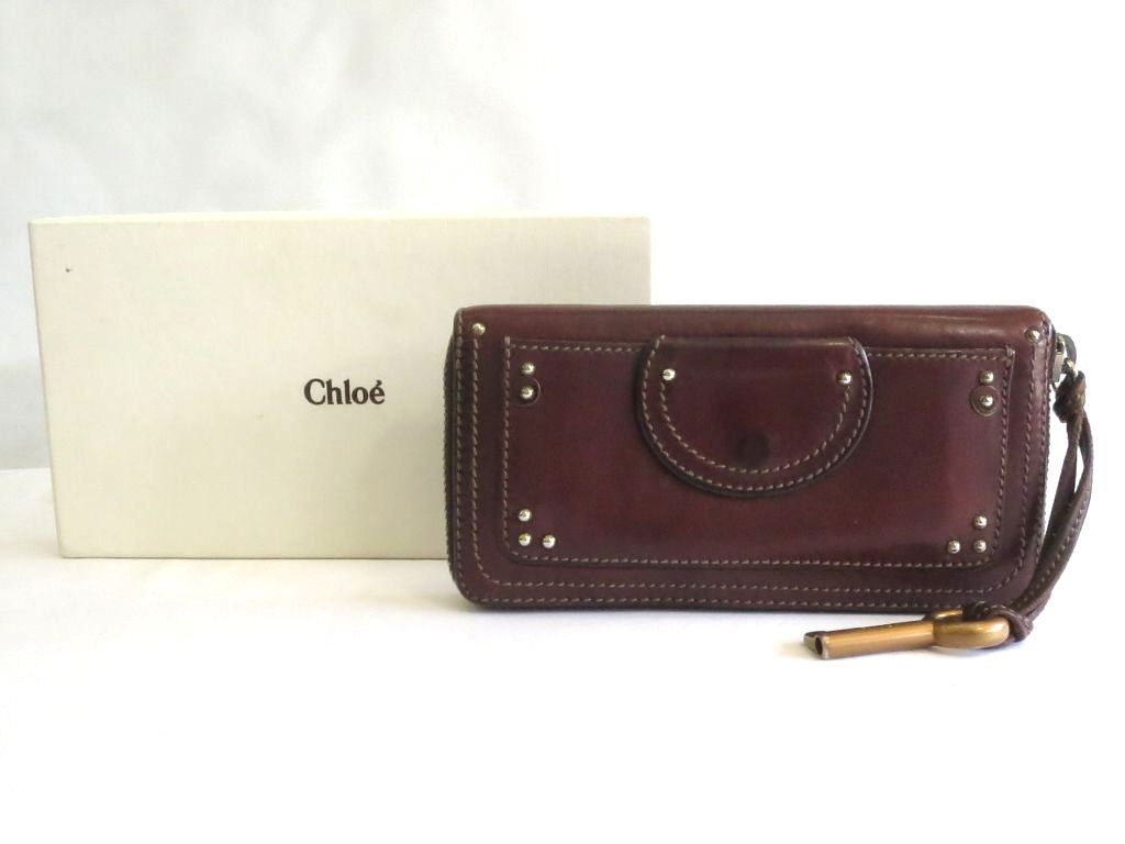 Rakuten - 【中古】Chloe クロエ レザー　キーチャーム×スタッズ　ラウンドファスナー長財布　※汚れ有り ブラウン ok5210232174