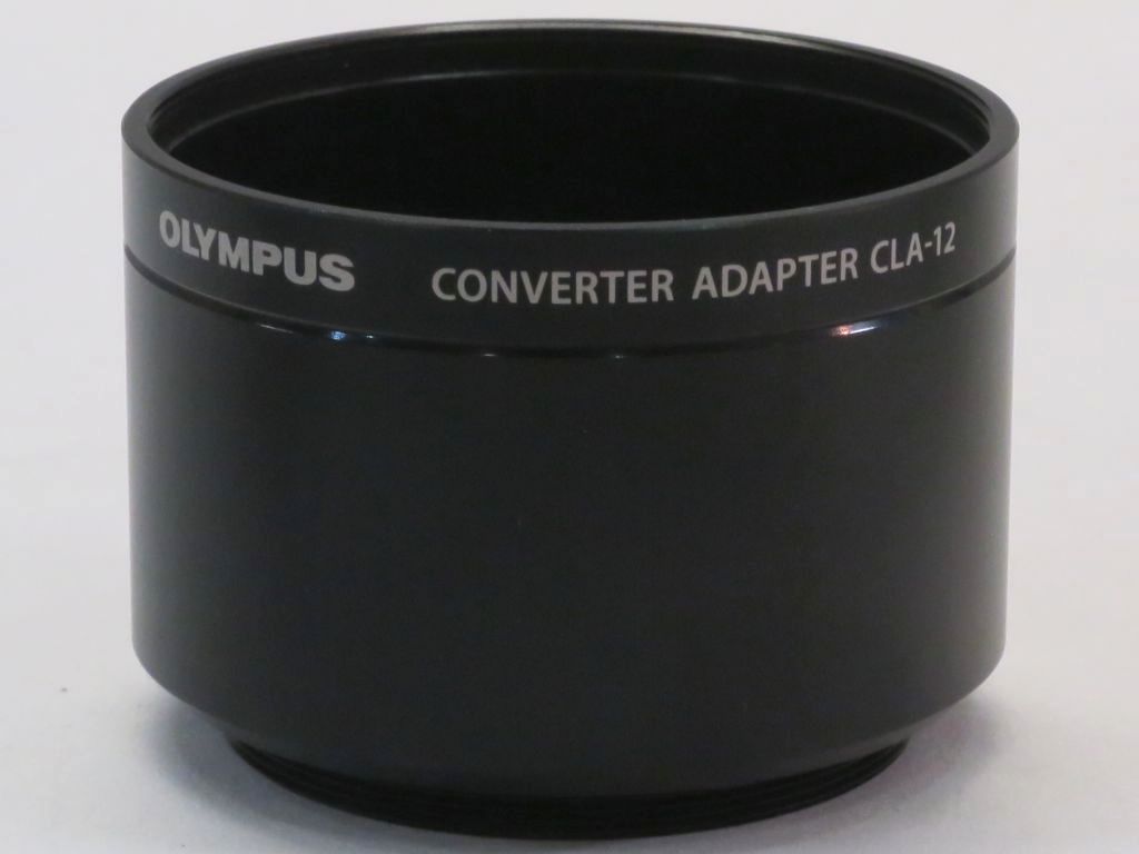 ブランド名OLYMPUS(オリンパス)商品名コンバージョンレンズアダプター CLA-12カラーブラック 商品説明主にOLYMPUS デジタルカメラ XZ-1 / XZ-2 用 support.jp.omsystem.com/jp/support/cs/DI/AccM/DI000390J.htmlおまけとしてXZ-1 レンズキャップ付き item.fril.jp/e2a2255612eb2f4add0b7d86cf42f8d7落札価格参考aucview.aucfan.com/yahoo/c1183788246/ 8358円で落札サイズ ( W * D * H )カメラ取り付け径：46.5mm フィルタ取り付け径：55mm 全長：41.45mm（ネジ部除く全長36.9mm）付属品XZ-1 レンズキャップ おまけ付きコンディションレベルB+（通常中古品）コンディションレベルの備考【B+ の目安】目立つ箇所や場所にキズや擦れ・汚れなどが見当たるものの、コンディション自体は悪くない中古品です※お客様のご都合によるサイズ違いや状態による返品はしておりません。写真や内容を良くご確認のうえ、ご入札・ご購入くださいませ。管理番号(弊社使用欄)kb5216234115 【6h93】【Vision】【ビジョン】≪≫OLYMPUS オリンパス コンバージョンレンズアダプター CLA-12 ブラック