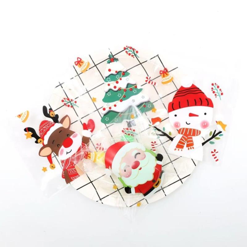 Rakuten - 100pcsクリスマスのセロハン袋のギフト袋 のキャンデーのクッキー包装袋 プラスチック袋 ギフト 祝祭 誕生日 記念日 クリスマス