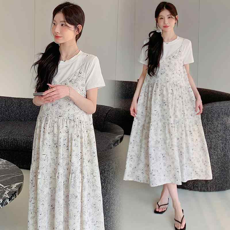 ワンピース マタニティ レディース 春夏 小花柄 妊婦服 半袖 切り替え 膝丈 きれいめ カジュアル 普段着 お出かけ 外出用 産前産後 体型カバー フェミニン おしゃれ・カテゴリ: 连衣裙・領型: 丸首・袖丈: 三分袖・素材名: ポリエステル・主な素材成分: ポリエステル（ポリエステル繊維）・主な素材配合率: 80-90%・柄: 配色・スカート丈: ロングスカート・カラー展開: ホワイトトップス, アプリコット花柄スカート, ブラック花柄スカート・サイズ展開: M, L, XL, 2XL・スカート型: Aラインスカート・スタイルタイプ: ストリート系・袖型: 通常袖・素材成分2配合率: 80-90%・素材成分2: ポリエステル（ポリエステル繊維）