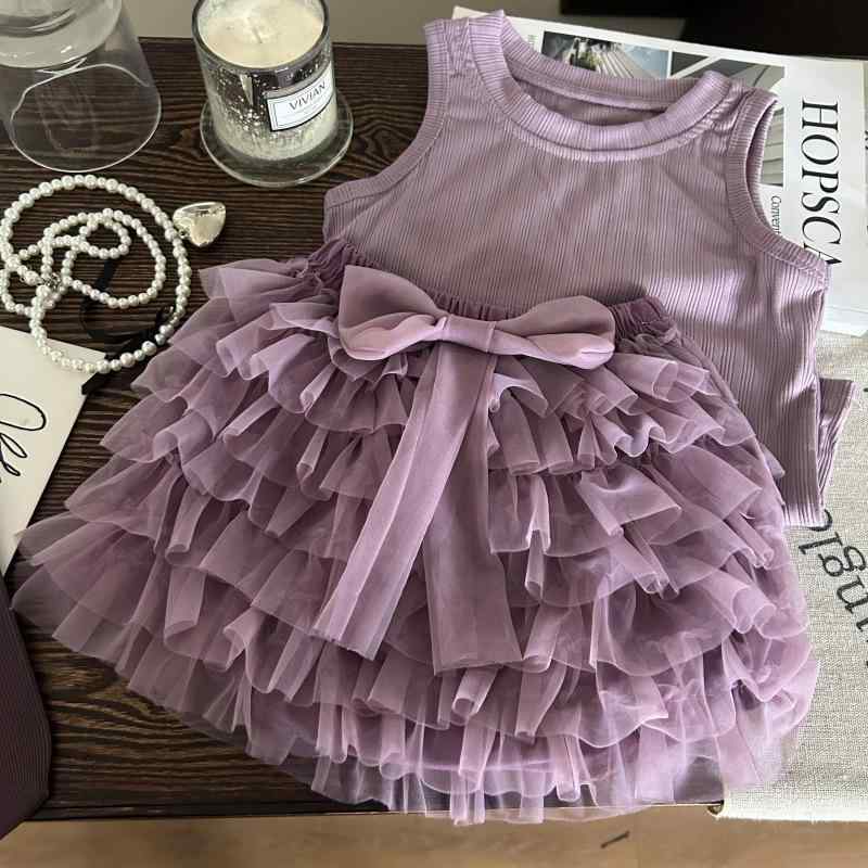 ・カテゴリ: 子供用セットアップ・対象性別: 女の子・スタイル: 韓国風・セット内容: スカートセット（2点セット）・対象年齢: 中小童（3〜8歳、100〜140cm）・袖丈: ノースリーブ・フード: フードなし・生地加工: 柔軟処理・厚み: 普通・柄: 無地・主な素材: 綿混紡・主面料成分: 綿90%・安全基準: B類・着用タイプ: プルオーバー・カラー展開: セット、パープルベスト、パープルキュロットスカート・展開サイズ: 80cm、90cm、100cm、110cm、120cm、130cm、140cm