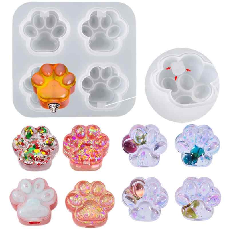 BOHALUU(ボハル) シリコンモールド 猫の肉球 レジン型 肉球 ライト穴付き UVレジン 猫足 DIY 手芸品 抜き型 手作り 猫の肉球 4個【お得なシリコンモールド】ネコの肉球が作れるシリコンモールドです。モールドが半透明なのでレジンに最適です。 UVレジン、エポキシ樹脂、樹脂粘土などに ご利用いただけます。【サイズ】約130mm×120mm×30mm、ライト穴のサイズ：直径10mm×7mm。ライトは梱包に含まれません。【キラキラして可愛い猫の爪】ライト穴付きデザインの猫の爪を作ることができます。流砂タイプ猫の爪、ライトタイプ猫の爪、普通の猫の爪が作れます。ライト穴付きますので、ライトを穴にさしこんで、飾り小物としても、キーホルダーとしても使えます。【耐久性と透明な素材】BOHALUU(ボハル) シリコンモールドは高品質で安全で丈夫なのシリコン素材を使用しているので、柔らかく、型から抜きやすくなっているので、初めての方でも安心です。【お手入れは簡単】ぐにゃりと曲げられるので、細かいところまで洗えて、乾燥してください。今度は再利用できますよ。【カスタマーサポート】BOHALUU本社にて、厳しい検品基準を設けた上で品質チェック、梱包、発送を行っております。万が一破損、誤送の場合は弊社に連絡して、至急代品を発送いたします。
