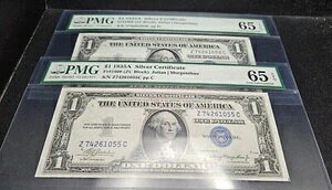 2 つの連続したシリアル番号 1935A $1 Fr.1608 シルバー証明書 PMG 65 Gem Unc.