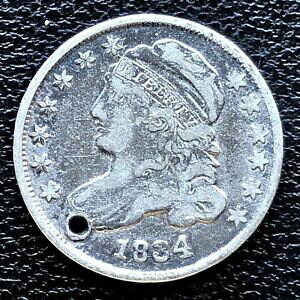 1834 Capped Bust Dime 10c Higher Grade VF Det. #18637※関税は当ショップ負担（お客様負担無し）※全国送料無料・海外輸送無料※商品の状態は画像をご確認下さい（極美品・目立った汚れ無し）※輸入品の為英語表記となります※その他ご不明点はお気軽にお問合せ下さい！Year: 1834Circulated/Uncirculated: CirculatedCertification: Uncertified[ご購入前に必ずお読み下さい]親切丁寧に、商品到着までサポート対応させていただきます。■パソコンの画像・画質により色や素材感が、実際の商品と多少異なる場合がございますので予めご了承くださいませ。■お客様のご都合（程度の解釈相違を含む）による商品のご購入後のキャンセル返品は、原則としてお受け致しておりません。未払いのまま2日以上連絡が取れない場合はキャンセルさせて頂きます。その場合、事務局側が自動的に「非常に悪い」の評価を付けてしまいますのでご注意ください。※お支払い頂いた場合は連絡は不要です。※他ショップでも販売しておりますので、稀に在庫がない場合がございます。■不具合での返品は箱などすべてが到着時の状態になるものに限らせていただきます。※当店では不良品はすべて現物確認と不具合の確認を行い対応をさせて頂いております。■お客様のご都合によるご注文確定後の商品のキャンセルにつきましては承っておりません。また、ご入金確認後、またはご決済完了確認後のキャンセルにつきましては、ご注文総額の30％のキャンセル料をご請求させていただきます。■領収書二重発行やトラブル防止のため、領収書発行は行っておりません。事務局側が発行している「支払い明細」が正式な支払い証明となります。支払い明細画面を印刷したものが領収書の代わりになることを各税務署に確認済みです。■年末年始・連休の発送は、業者も休みになる関係でいつもより遅れます。■輸送時の破損の場合は配送業者への報告を行って下さい。報告なしでの対応はできません。■日祝日は定休日とさせていただいております。連絡・発送が出来ませんのであらかじめご了承お願いいたします。■内容は必ずお読みになってからお買い求め下さいますようお願い致します。※在庫状況は常に更新をしておりますが、当社は複数店舗で在庫を共有しているため、ご注文を頂きましても稀に欠品している場合がございます。その際は誠に申し訳ございませんが、その旨をメールまたはお電話にてご連絡させていただきます。ご理解いただけますようお願い申し上げます。親切・丁寧にお取引させていただきますのでよろしくお願いします。 品質保証について 当店の商品の、品質保証についてご紹介いたします。 ▽品質保証書 お買い上げいただく全ての商品に「WORLD RESOURCE品質保証書」をおつけいたします。 これは、WORLD RESOURCEが販売した商品であることを保証するものです。大切に保管してください。 ▽標準保証に関して 当店でご購入頂きました商品は7日以内の標準保証サービスが付属致します。 ※ご購入日につきましては、製品の品質保証書に記載の日付にて確認させていただきます。 ※保証は通常利用時のみの対応となります。 ※ご購入日の確認を致しかねる場合は有償となります。品質保証書は大切に保管して下さい。POINT01　品揃え一番店を目指して 「期待に答えるお店づくりと、時代に合わせたサービスをご提供致します。」 POINT02　多種多様な商品レパートリー 「幅広く、世界の商品をご用意しております。」 POINT03　きっと見つかる！新しい発見 「テレビや雑誌で紹介されたアイテムもいちはやく。」 モットー：丁寧な接客対応 その道数十年のスタッフだからこそできる、“豊富な知識”に基づく商品のご提案。 お探しの商品はお気軽にスタッフにお尋ねください。 「以前は、商品ページあったけど、、、見つからない。」 「初めてアンティークコインの購入をしますが大丈夫ですか？」 「この年代の商品を探していますが、おすすめはありますか？」 「友人にアンティークコインを送りたいけど、おすすめありますか？」 等など、困ったときの質問にも、しっかり対応・お調べ致します。 取寄せ、取り置き等もできますので、商品一覧で見つからなかった商品でも、 スタッフまでお気軽にご相談下さい。 【お問い合わせはお気軽にどうぞ】 suport@world-resource.net