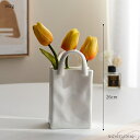 【Combination B】Ceramic Flower Vase Creativity White Flowerpot Nordic Home Accessories Living Room Center Tabl Decoration Storage Bag Vasesカテゴリオブジェ状態新品発送詳細 送料無料 （※北海道、沖縄、離島は省く）商品詳細輸入商品の為、英語表記となります。【コンビネーションB】セラミックフラワー花瓶クリエイティビティホワイトフラワーポットノルディックホームアクセサリーリビングルームセンタータブルデコレーション収納バッグ花瓶 【Combination B】Ceramic Flower Vase Creativity White Flowerpot Nordic Home Accessories Living Room Center Tabl Decoration Storage Bag VasesOrigin: CN(Origin)Style: ModernMaterial: Ceramic & Porcelain【コンビネーションB】セラミックフラワー花瓶クリエイティビティホワイトフラワーポットノルディックホームアクセサリーリビングルームセンタータブルデコレーション収納バッグ花瓶 【Combination B】Ceramic Flower Vase Creativity White Flowerpot Nordic Home Accessories Living Room Center Tabl Decoration Storage Bag Vases原産地：CN（原産地）、スタイル：モダン、素材：セラミック＆磁器※以下の注意事項をご理解頂いた上で、ご購入下さい※■商品の在庫は常に変動いたしております。ご購入いただいたタイミングと在庫状況にラグが生じる場合がございます。■商品名は英文を直訳で日本語に変換しております。商品の素材等につきましては、商品詳細をご確認くださいませ。ご不明点がございましたら、ご購入前にお問い合わせください。■商品購入後のお客様のご都合によるキャンセルはお断りしております。（ご注文と同時に商品のお取り寄せが開始するため）■お届けまでには、2〜3週間程頂いております。ただし、通関処理や天候次第で遅れが発生する場合もございます。■輸入品につき、商品に小傷やスレなどがある場合がございます。商品の発送前に念入りな検品を行っておりますが、運送状況による破損等がある場合がございますので、商品到着後は速やかに商品の確認をお願いいたします。■商品説明文中に英語にて”保証”に関する記載があっても適応されませんので、ご理解ください。なお、商品ご到着より7日以内のみ保証対象とします。■商品の破損により再度お取り寄せとなった場合、同様のお時間をいただくことになりますのでご了承お願いいたします。■海外製品の輸入代行も行っておりますので、ショップに掲載されていない商品でもお探しする事が可能です。■業販や複数ご購入の場合、割引の対応も可能でございます。■お値引きの交渉なども承ります。お気軽にお問い合わせ下さい。オブジェ 雑貨 置物 置き物 おしゃれ