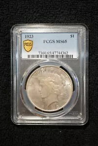 1923 ピース シルバー ダラー、PCGS MS65、フィラデルフィア ロール エンダー トナー!