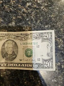 1990 年旧式の 20 ドル紙幣が流通