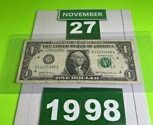 1 ドル誕生日メモ 1998 年 11 月 27 日。配布されました。派手なシリアル番号
