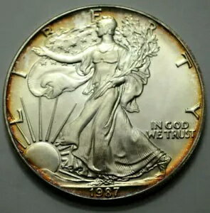 1987 アメリカン シルバー イーグル ドル 1 オンス 999 銀貨 ナット。ゴールデンリムトーニング