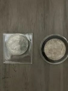 2 枚の銀貨 1878 年と 1878 年