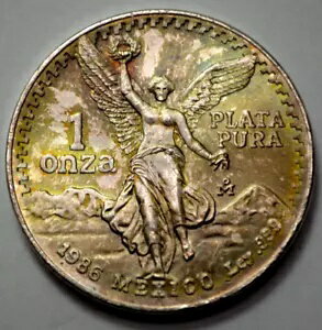 1986 UNC 1 オンス 999 シルバー メキシコ リベルタ プラ プラタ コイン、ナット付き。トーニングラウ..